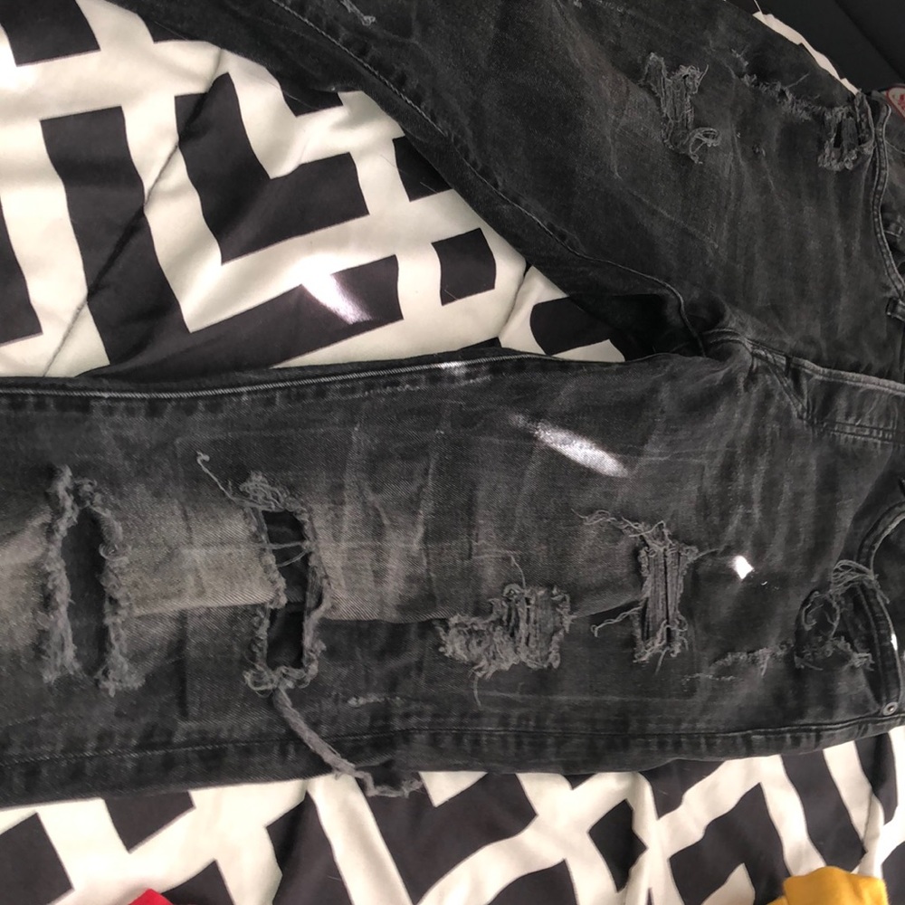 H&M black skinny with rips